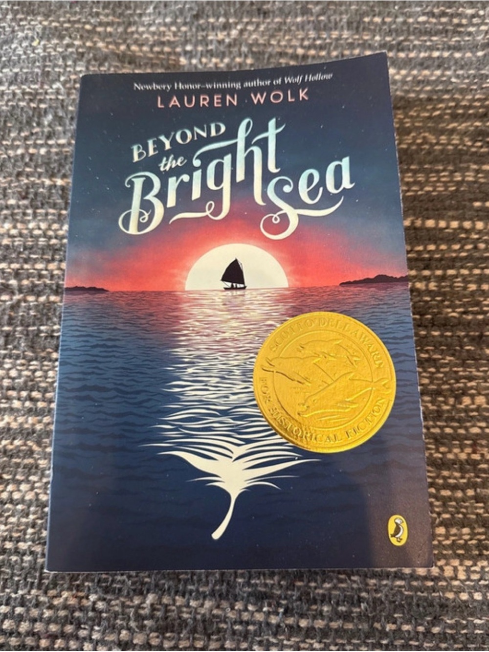 Beyond the Bright Sea by Lauren Wolk - Blue & Sunset Cover